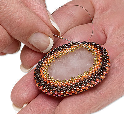 Cabochon set in seed beads